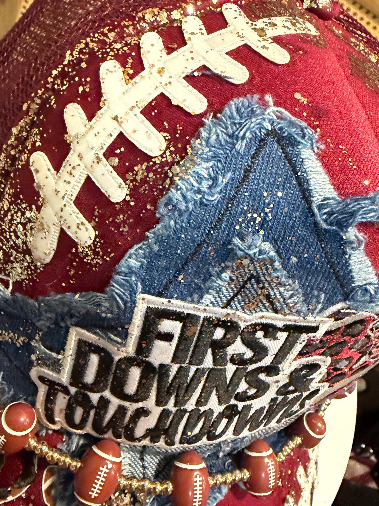 Blu Coconut first downs and touchdowns burgundy football Trucker hat š