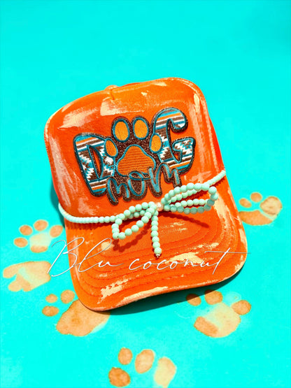 Blu Coconut orange and turquoise dog mom trucker hat