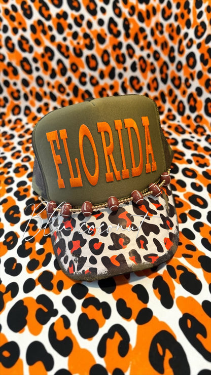 Blue Coconut green camo and orange leopard print football Trucker Hat 🧡