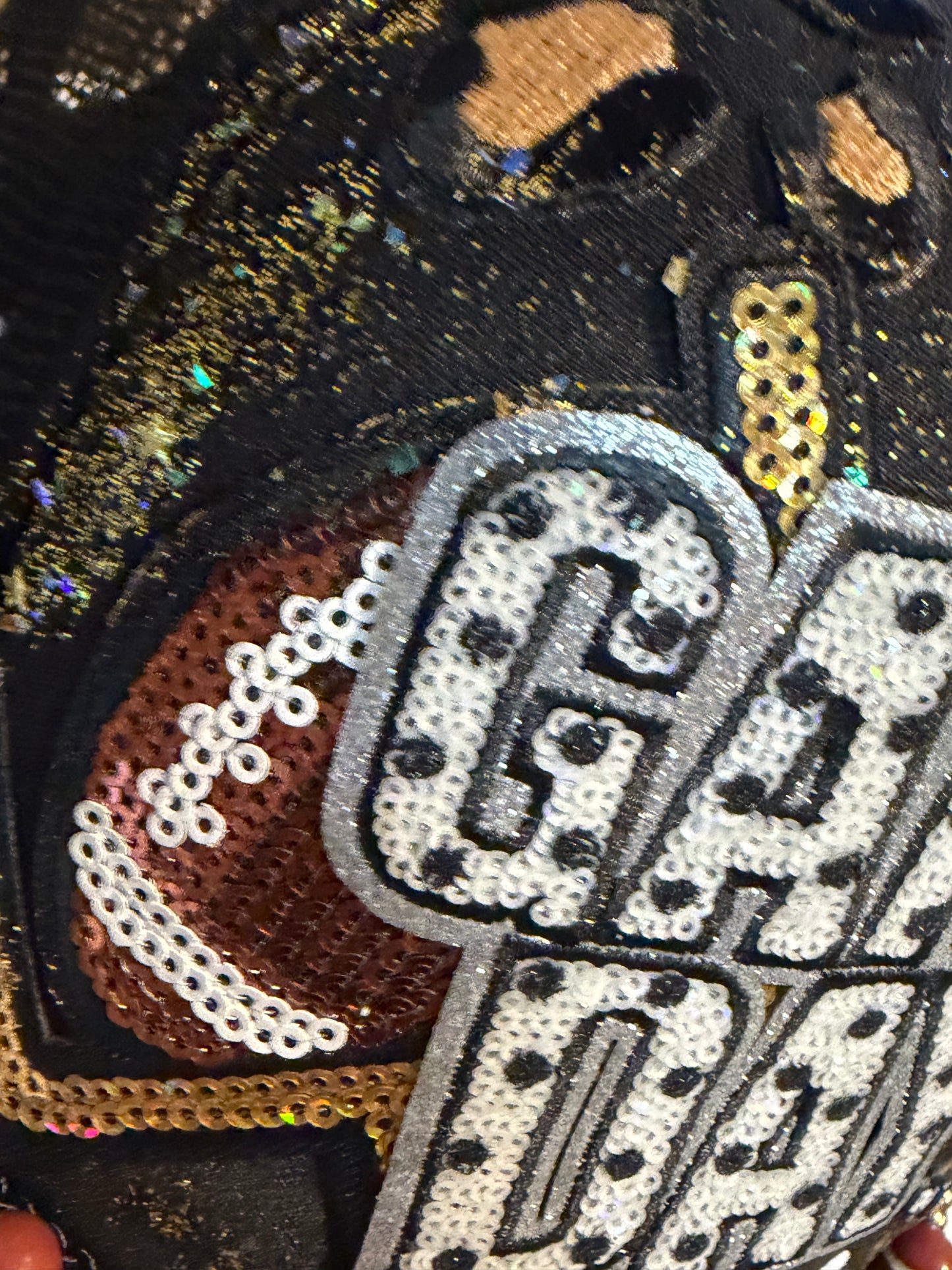 Blu Coconut black, gold and silver Game Day leopard print football trucker hat.