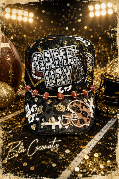 Blu Coconut black, gold and silver Game Day leopard print football trucker hat.