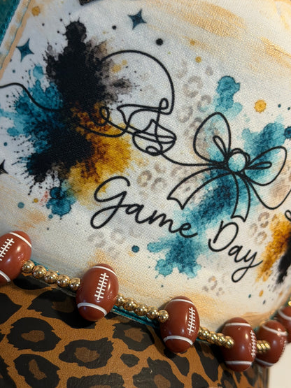 Blu Coconut Teal Leopard football Trucker