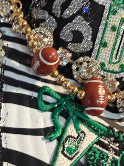 Blu Coconut Black and Green Football Trucker Hat. 💚🖤🏈