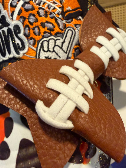 Blue Coconut black and orange bow football Trucker Hat 🧡 🖤🏈