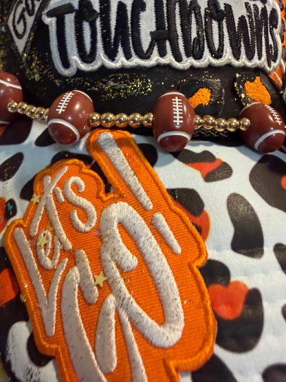 Blue Coconut black and orange bow football Trucker Hat 🧡 🖤🏈