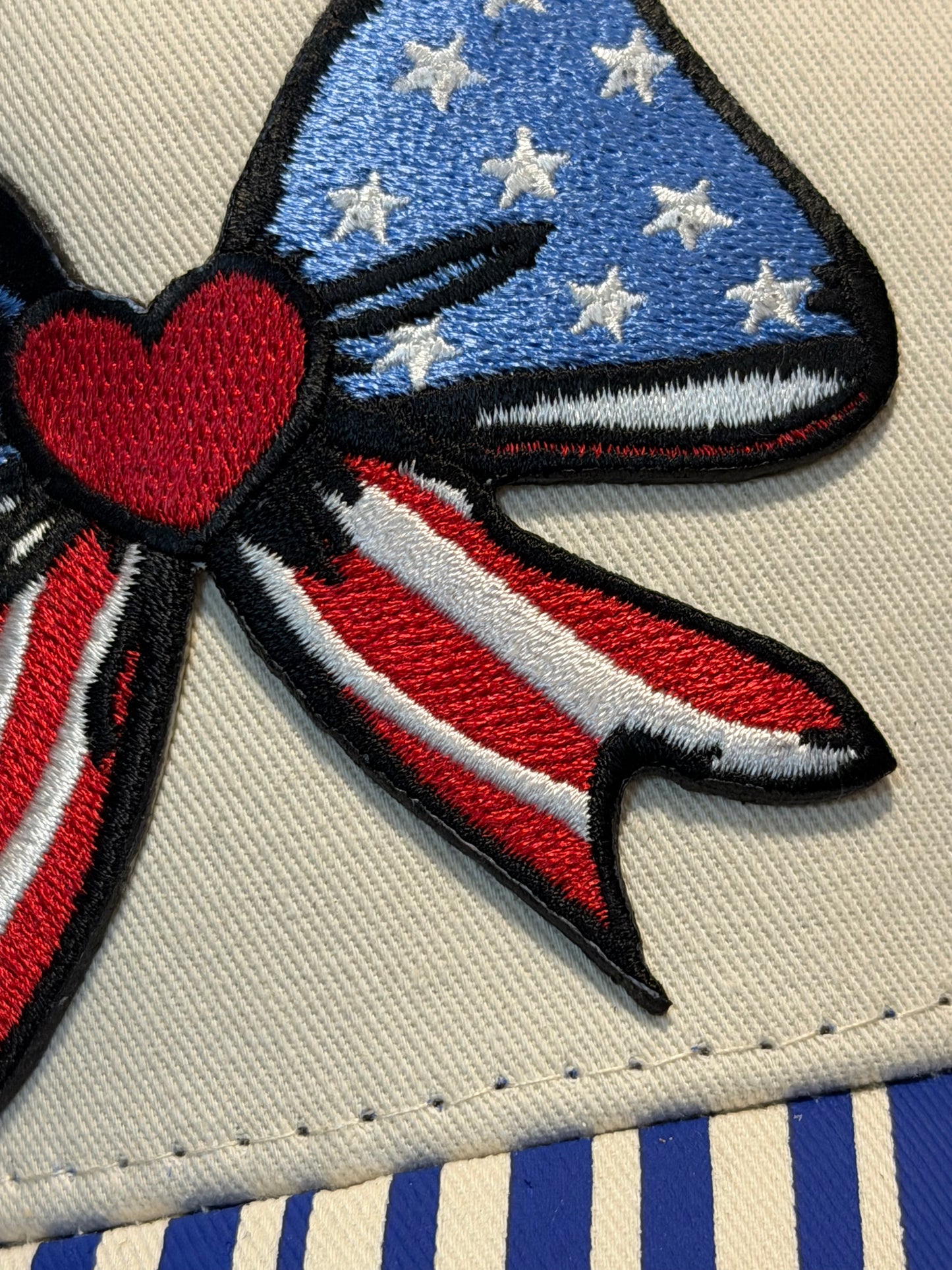 Blu Coconut Patriotic Bow Trucker