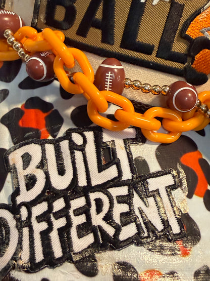 Blue Coconut brown and orange bow football Trucker Hat 🧡🤎🏈