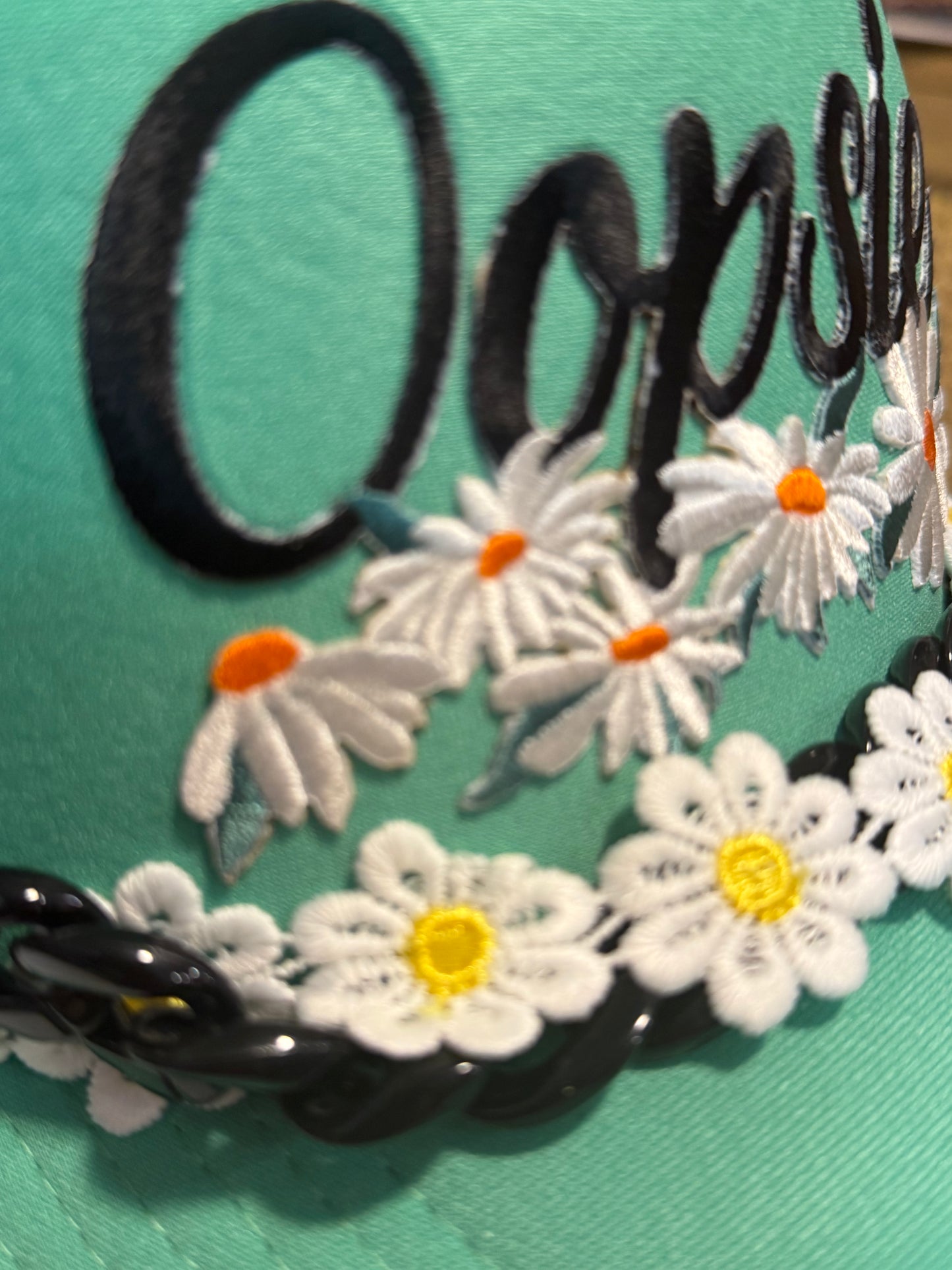 Blu Coconut Oopsie Daisy Trucker