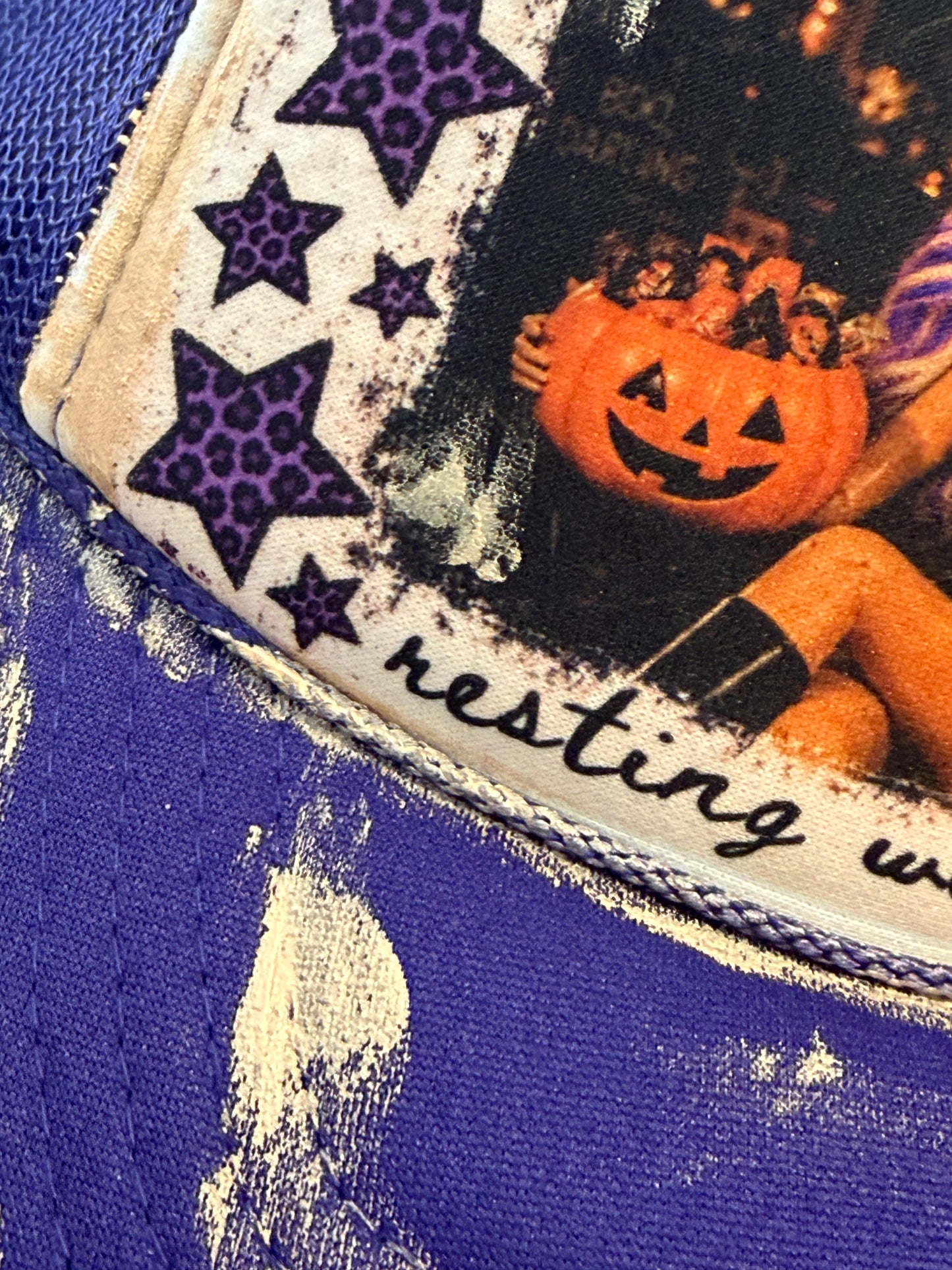 Blu Coconut purple and white resting witch face Trucker Hat