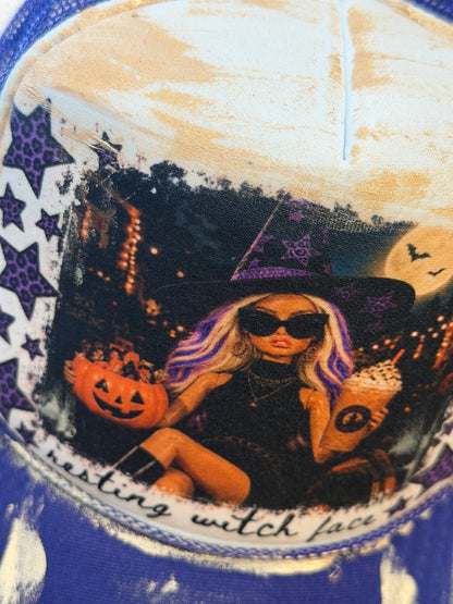 Blu Coconut purple and white resting witch face Trucker Hat
