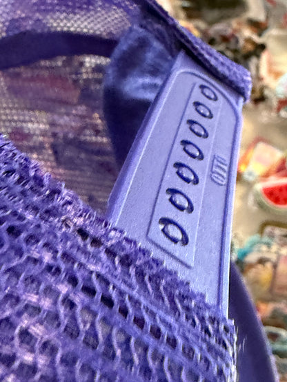 Blu Coconut purple and white resting witch face Trucker Hat