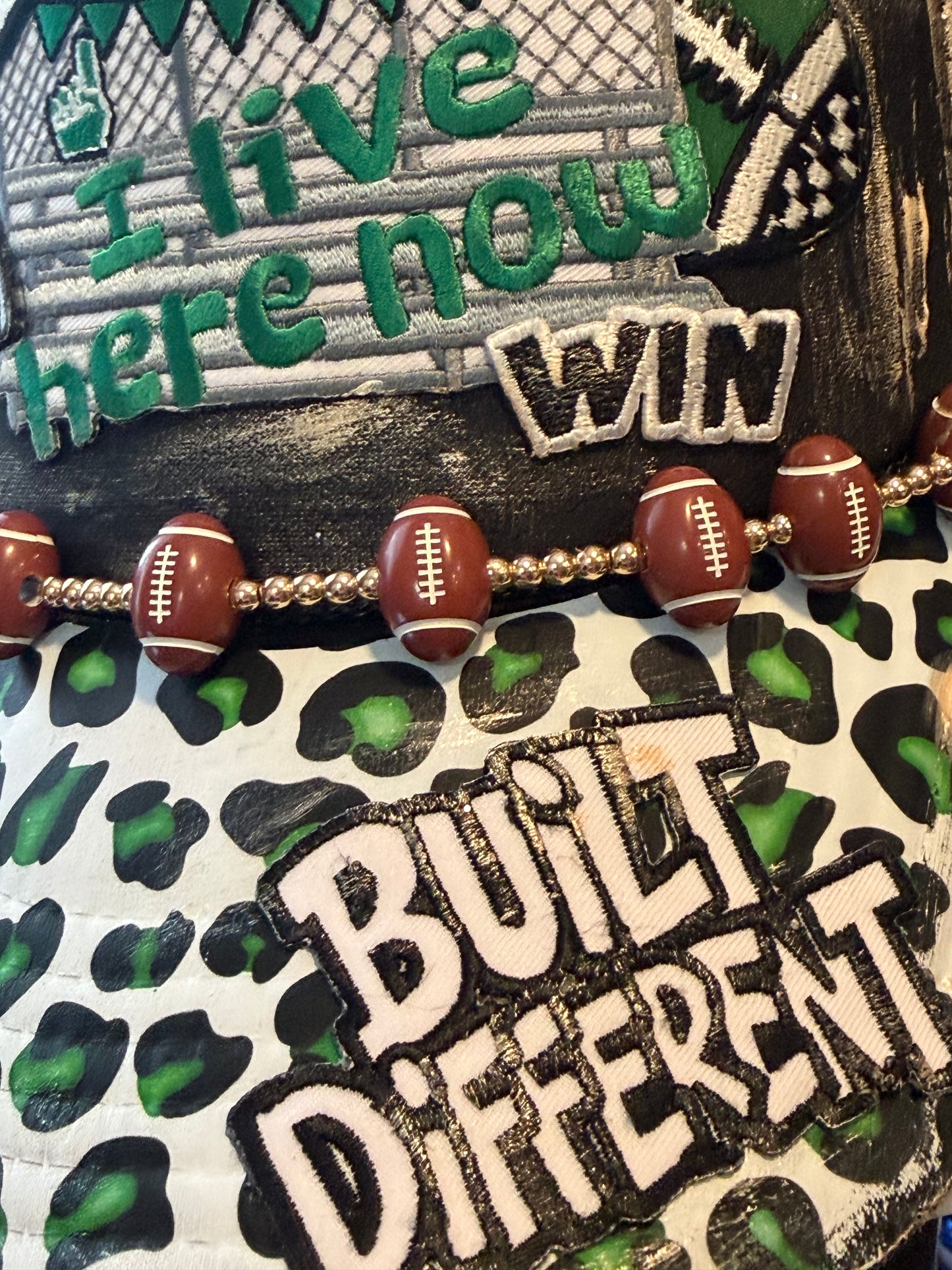 Blu Coconut Black and Green Football Trucker Hat. 💚🖤🏈