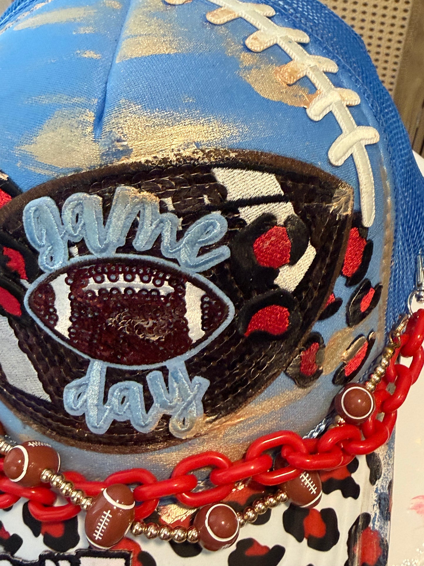 Blu Coconut Blu & Red Leopard Football Game Day Trucker Hat