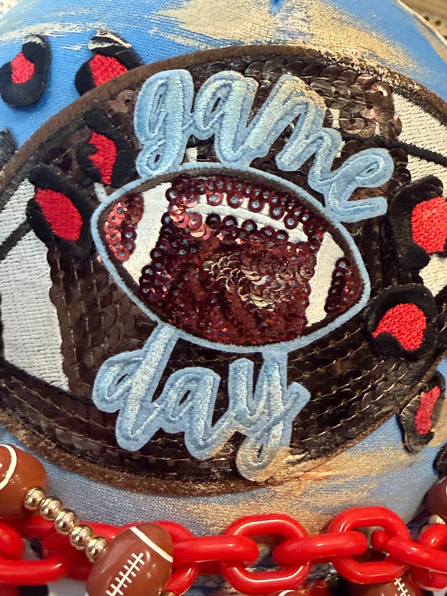 Blu Coconut Blu & Red Leopard Football Game Day Trucker Hat