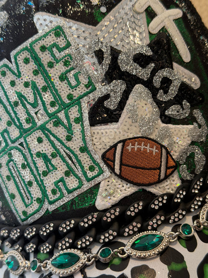 Blu Coconut Black and Green Football Trucker Hat. 💚🖤🏈