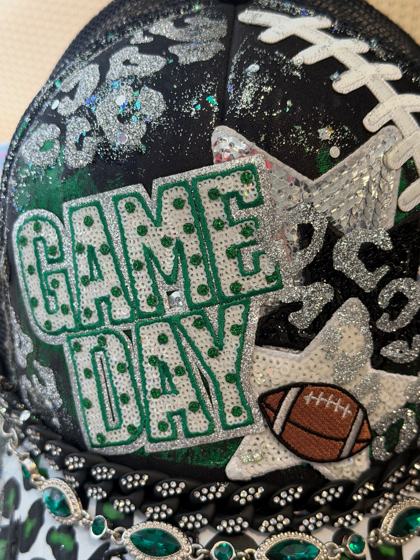 Blu Coconut Black and Green Football Trucker Hat. 💚🖤🏈