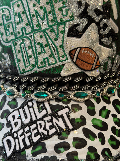 Blu Coconut Black and Green Football Trucker Hat. 💚🖤🏈