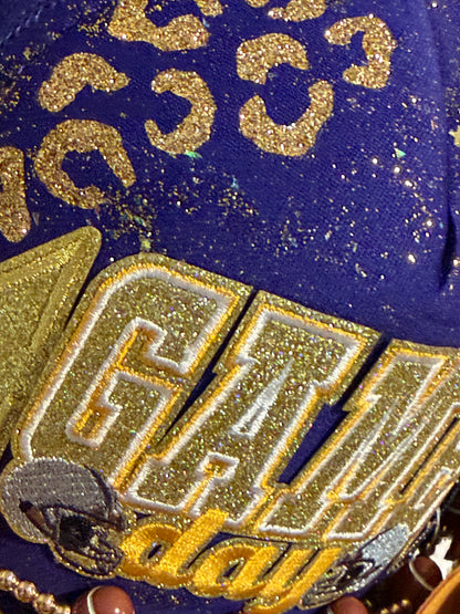 Blue Coconut Purple & Gold Trucker Hat.
