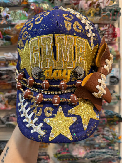 Blue Coconut Purple & Gold Trucker Hat.