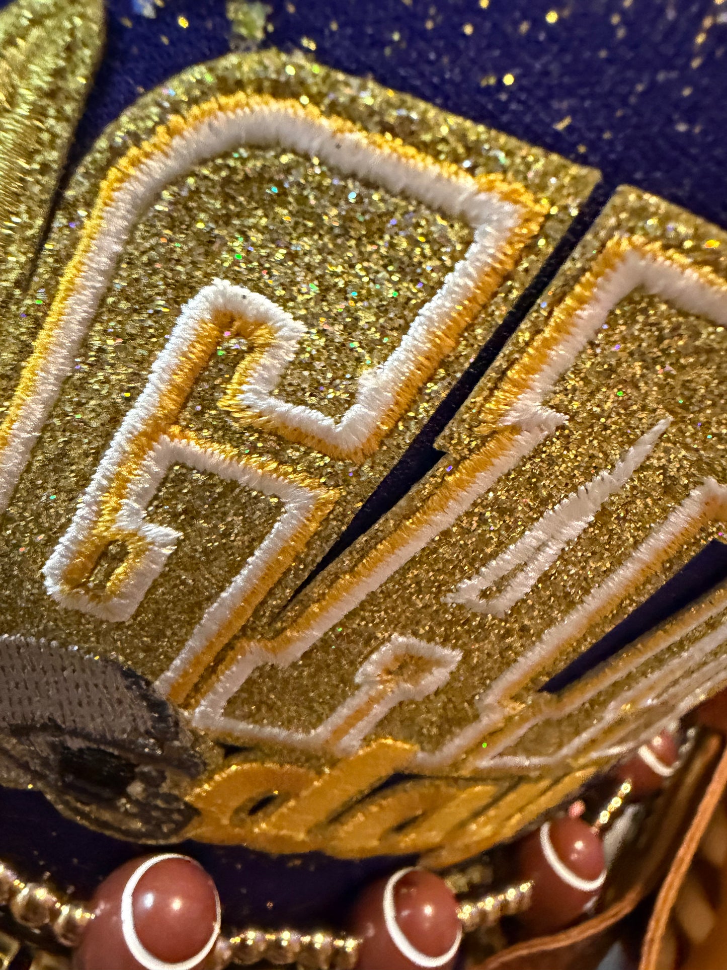 Blue Coconut Purple & Gold Trucker Hat.