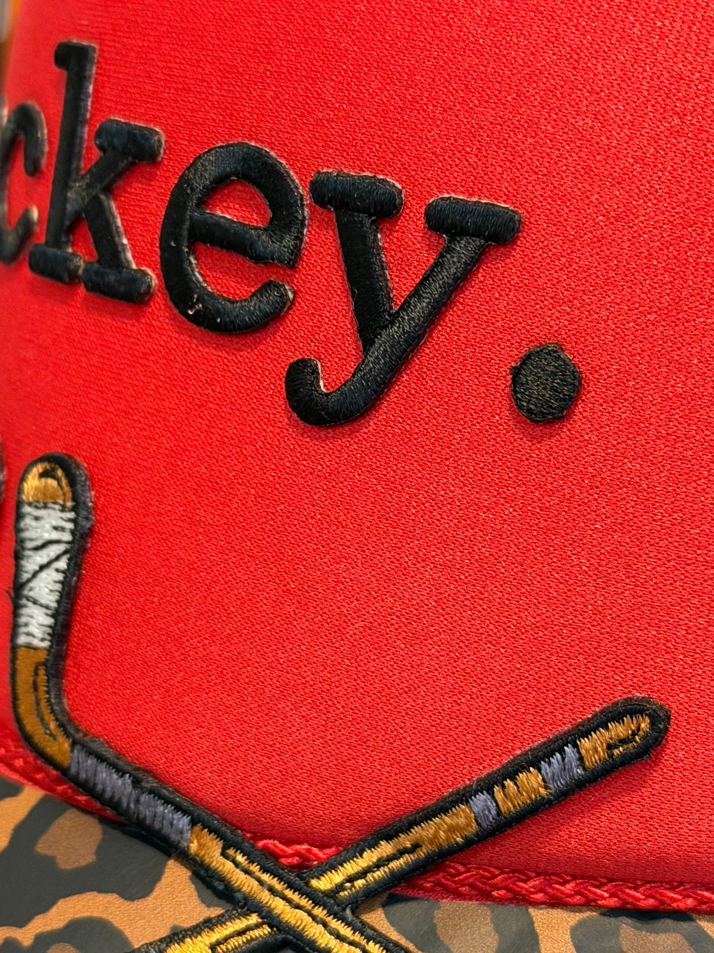 Blu coconut red and leopard print hockey Trucker ￼