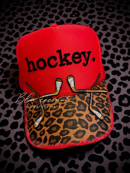 Blu coconut red and leopard print hockey Trucker ￼