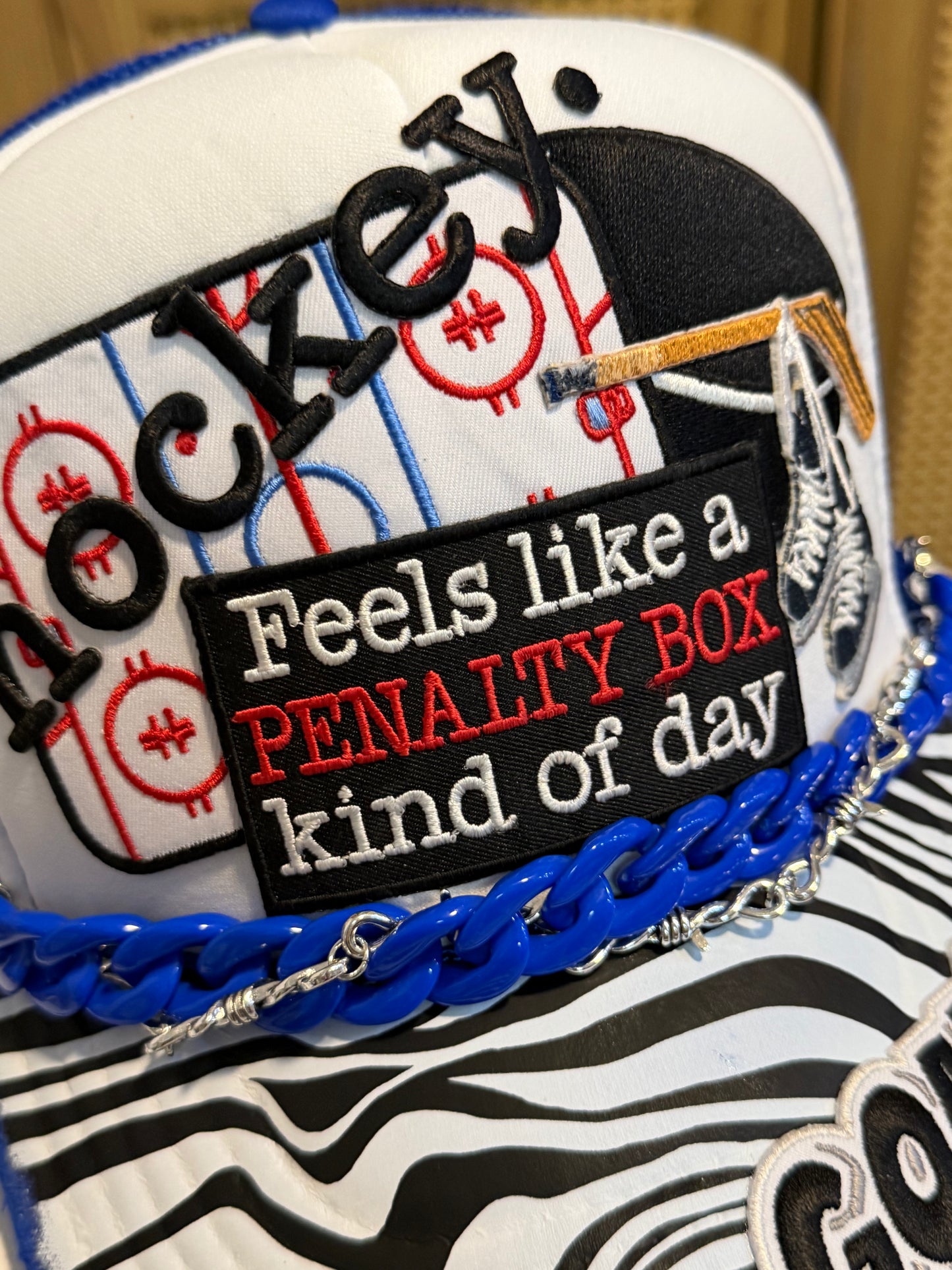 Blu Coconut blue and white hockey trucker
