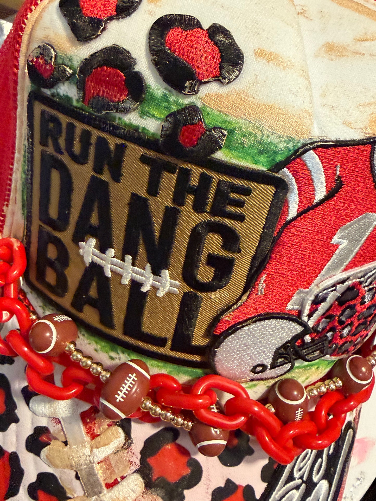 Blu Coconut Red Leopard Football Trucker Hat.