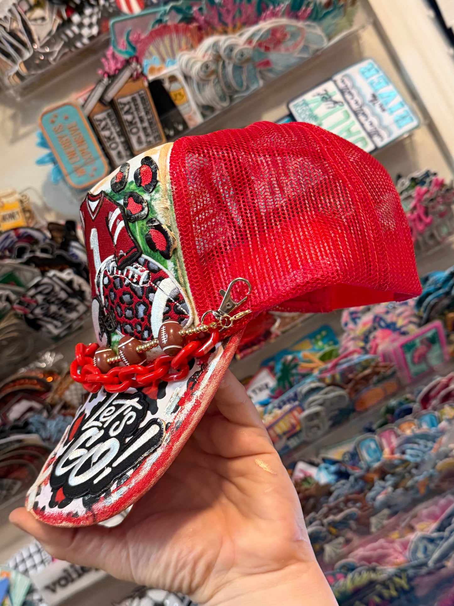 Blu Coconut Red Leopard Football Trucker Hat.