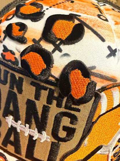 Blu Coconut Camo, white and orange run the dang ball trucker hat