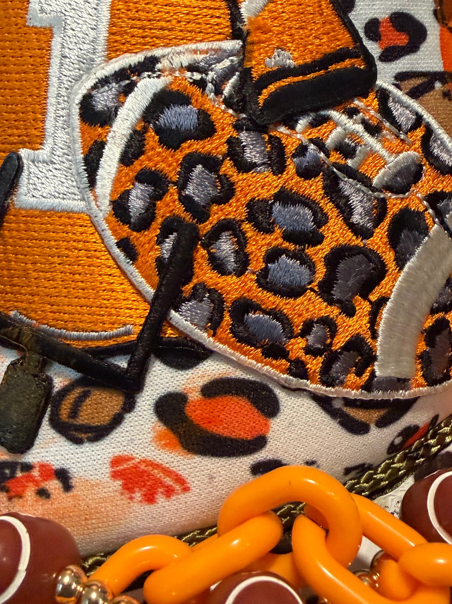 Blu Coconut Camo, white and orange run the dang ball trucker hat