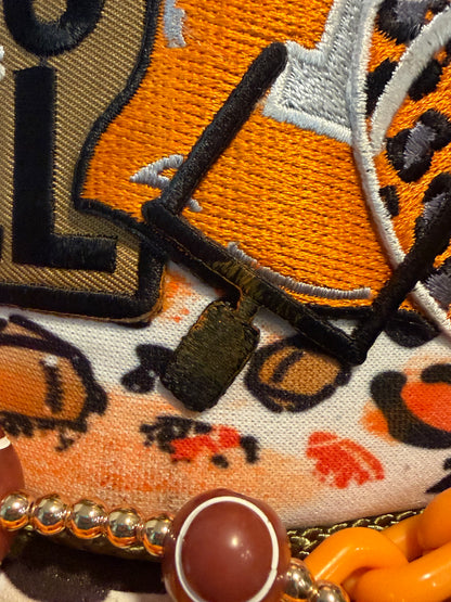 Blu Coconut Camo, white and orange run the dang ball trucker hat