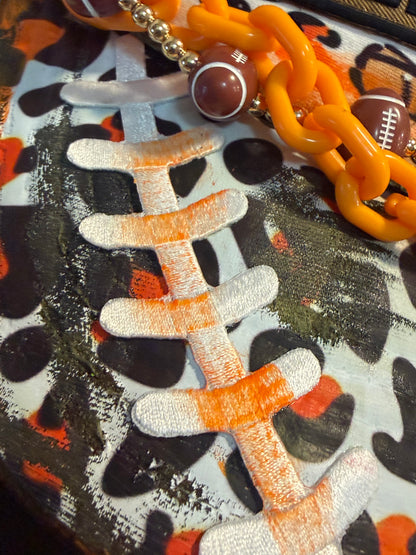 Blu Coconut Camo, white and orange run the dang ball trucker hat