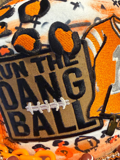 Blu Coconut Camo, white and orange run the dang ball trucker hat