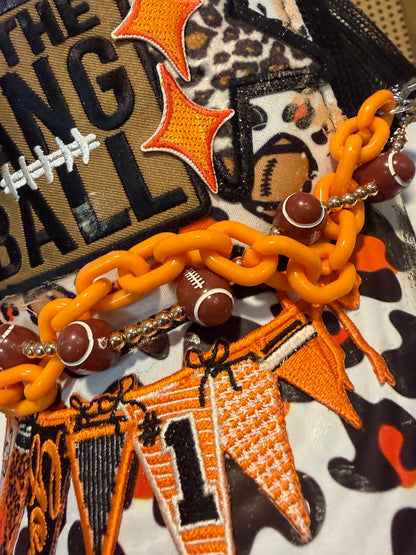 Blu Coconut Black, White and Orange Banner Football Trucker Hat.