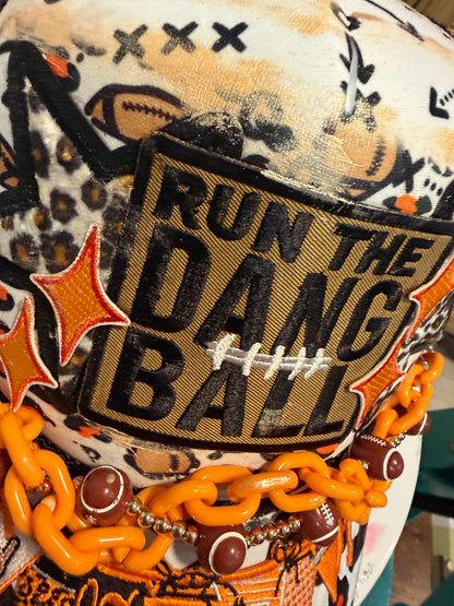 Blu Coconut Black, White and Orange Banner Football Trucker Hat.