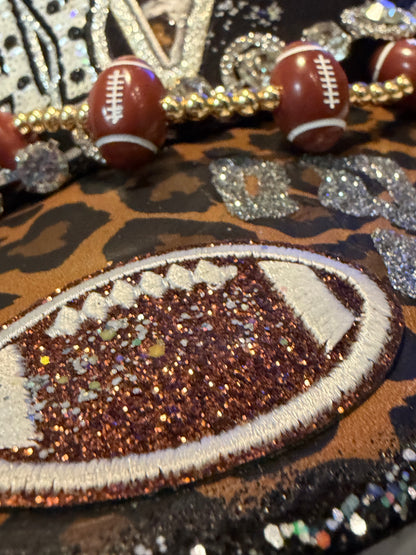 Clu coconut glam game day trucker hat.