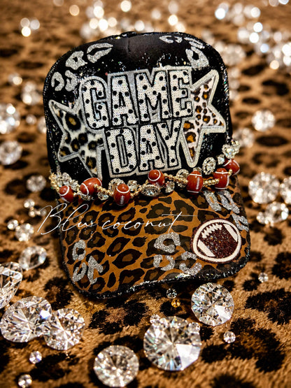 Clu coconut glam game day trucker hat.