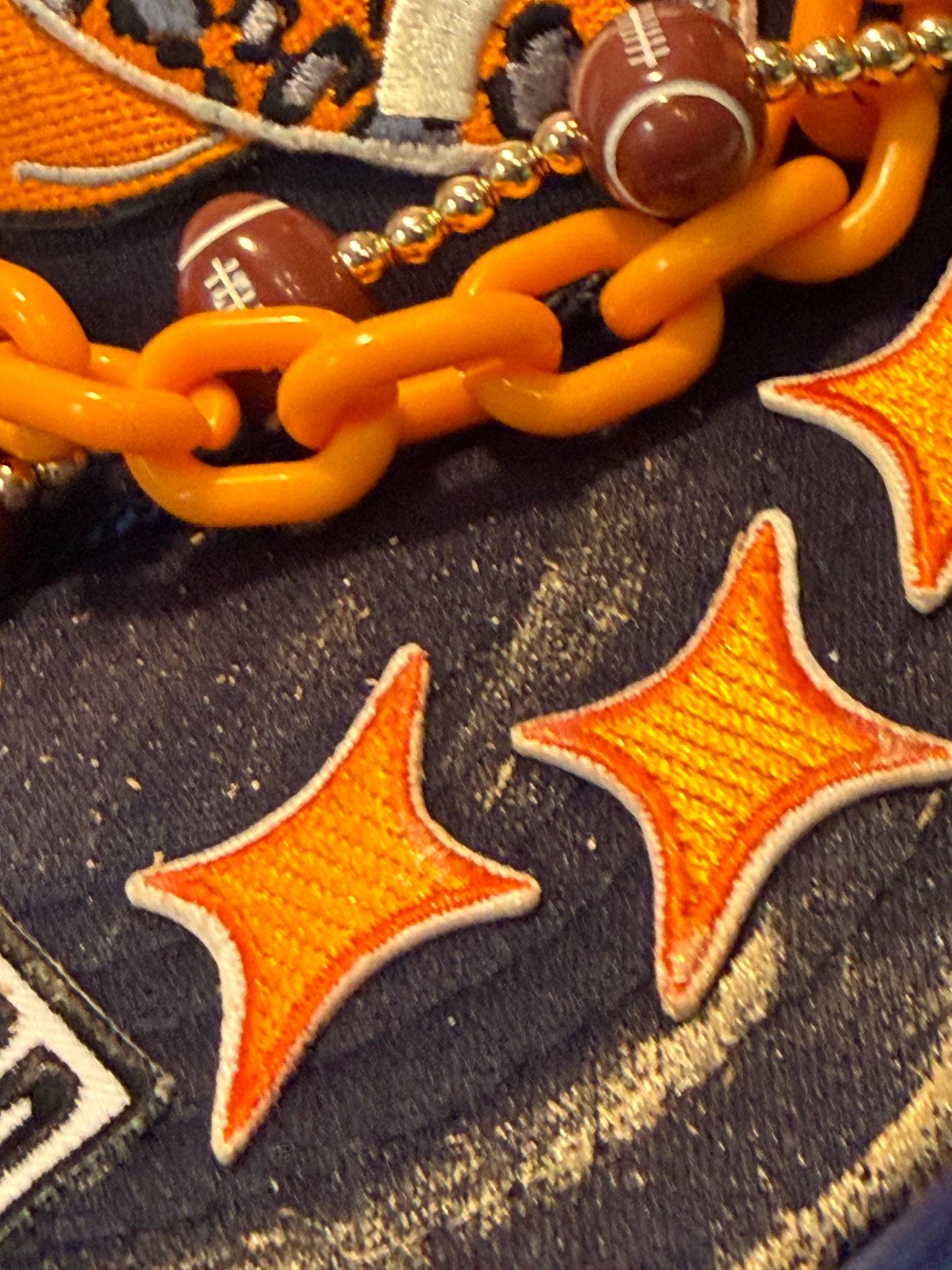 Blu coconut navy and orange football trucker