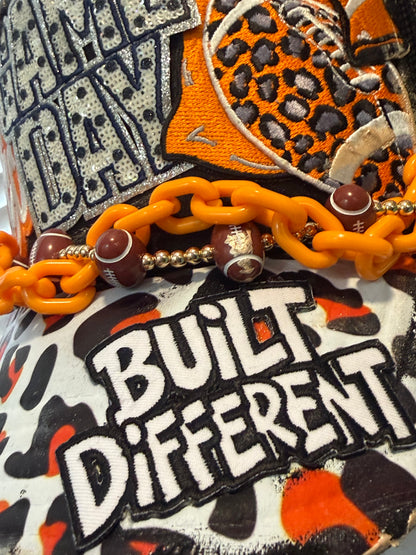 Blu Coconut black and orange football Trucker hat