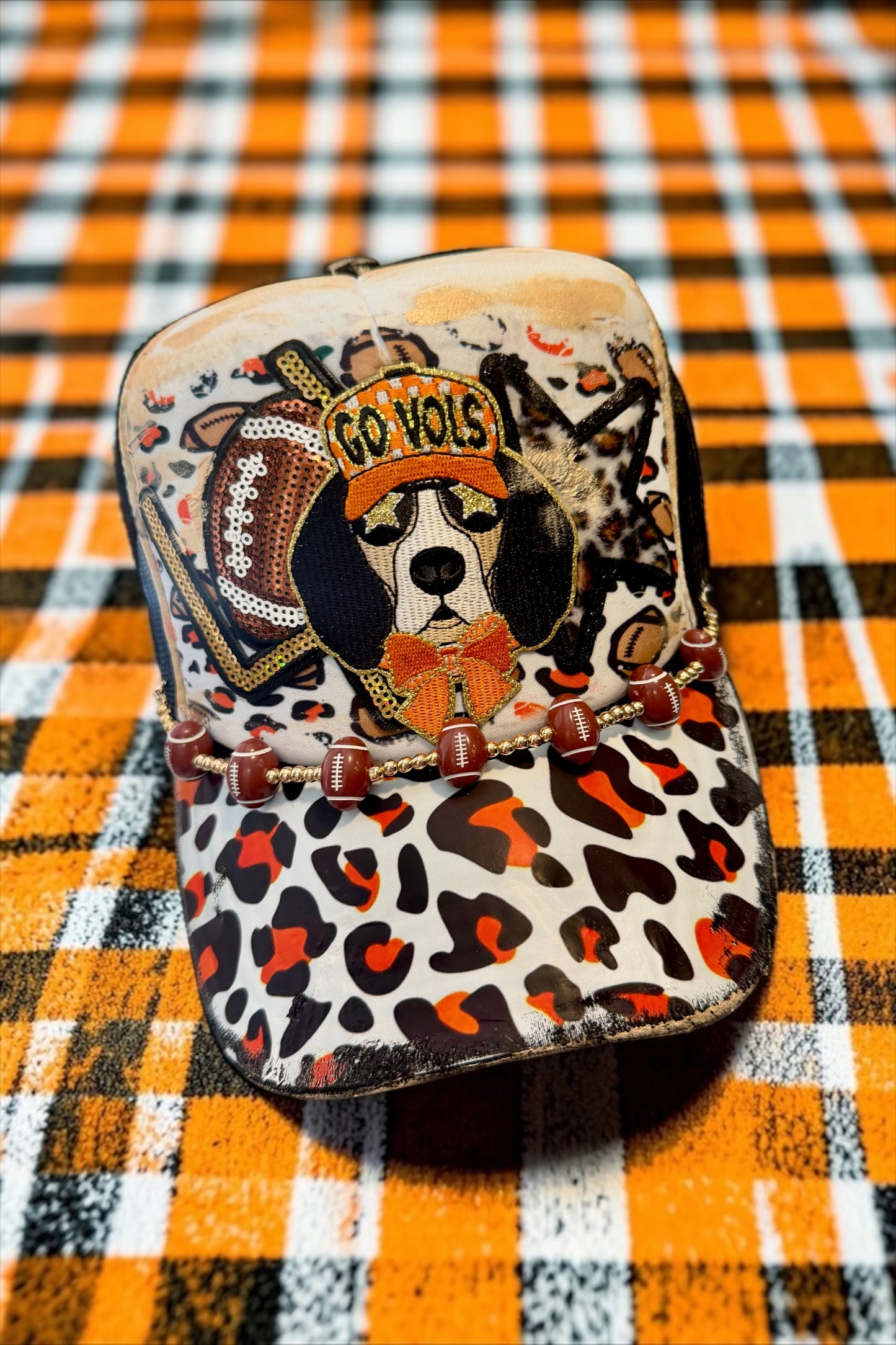 Blu Coconut orange leopard football Trucker hat