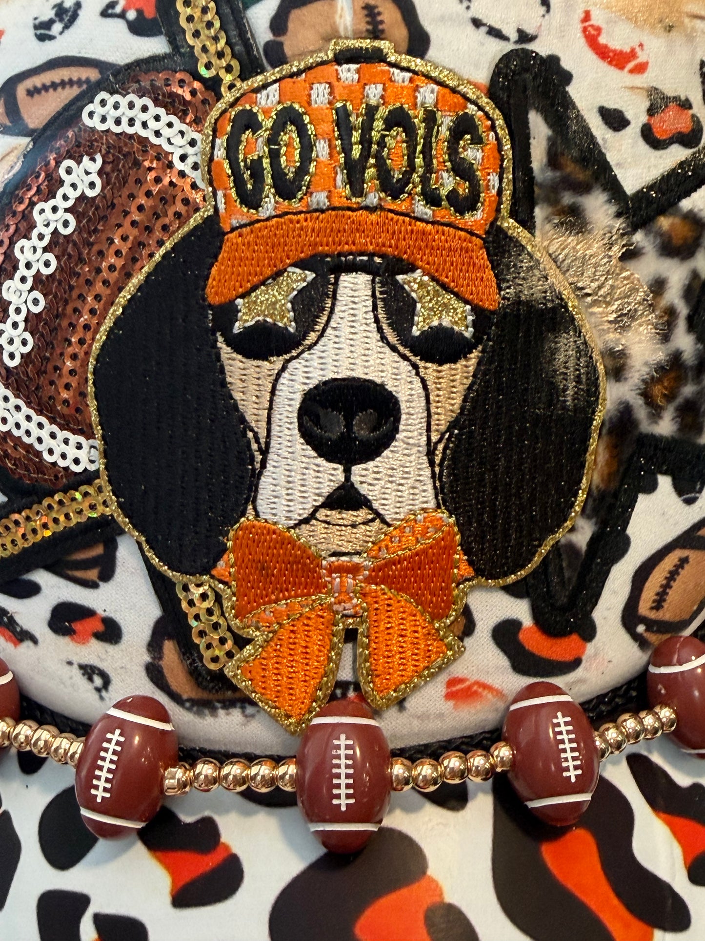 Blu Coconut orange leopard football Trucker hat