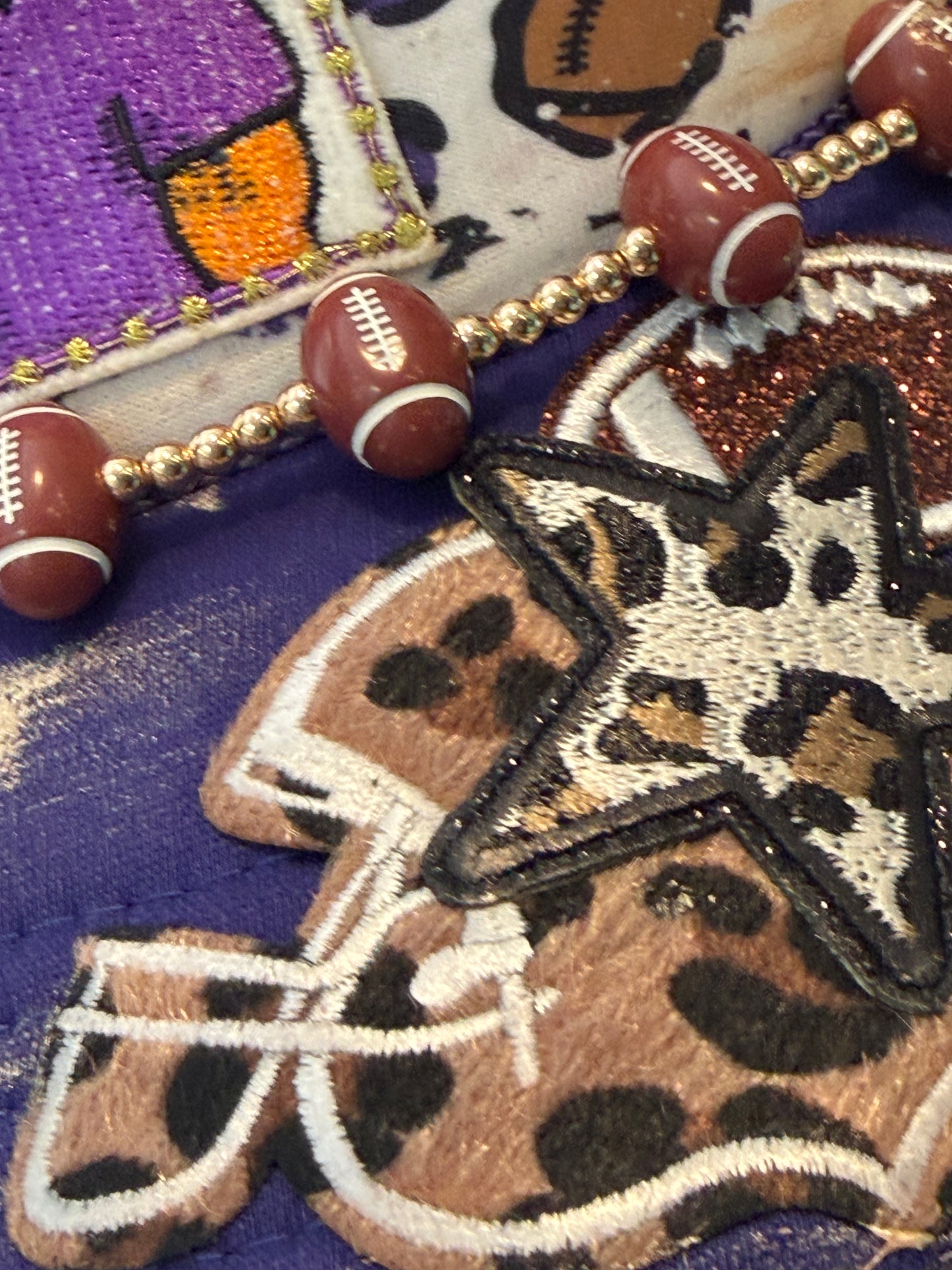 Purple tigers football trucker hat