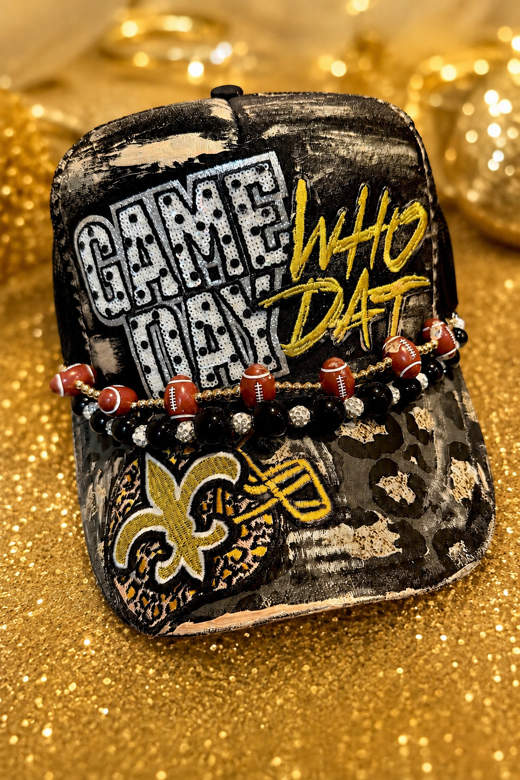 Black and gold leopard game day trucker hat