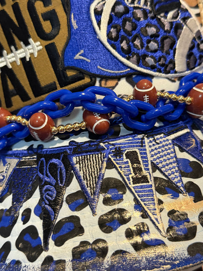 Blu Coconut run the dang ball football trucker hat.