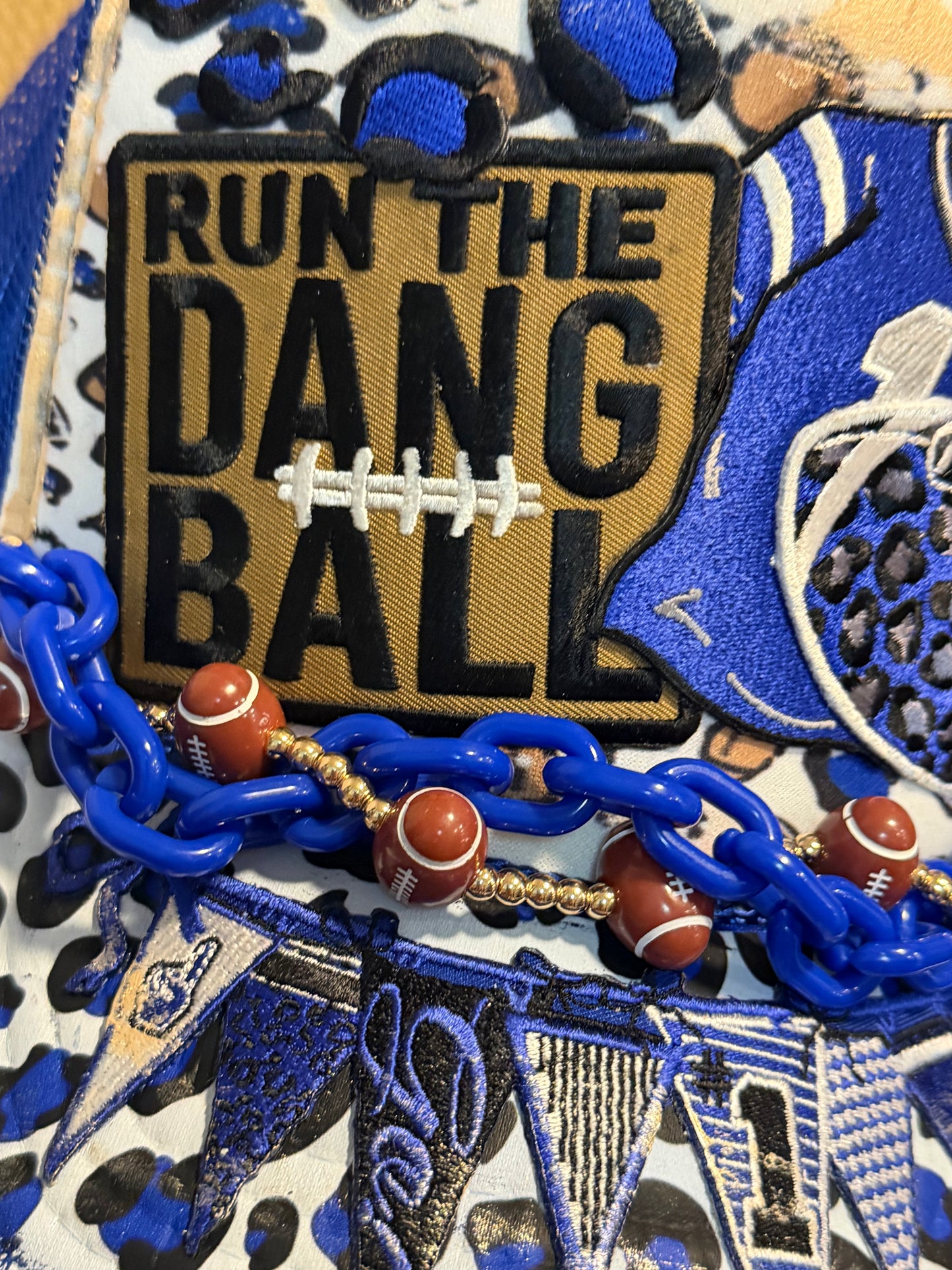 Blu Coconut run the dang ball football trucker hat.