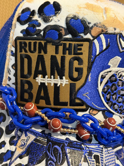 Blu Coconut run the dang ball football trucker hat.