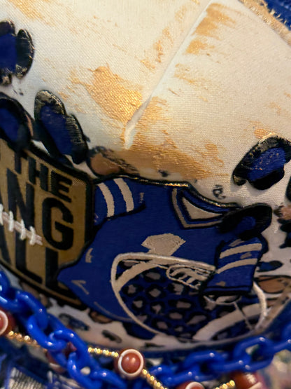 Blu Coconut run the dang ball football trucker hat.