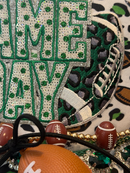 Blu Coconut green game day football Trucker hat