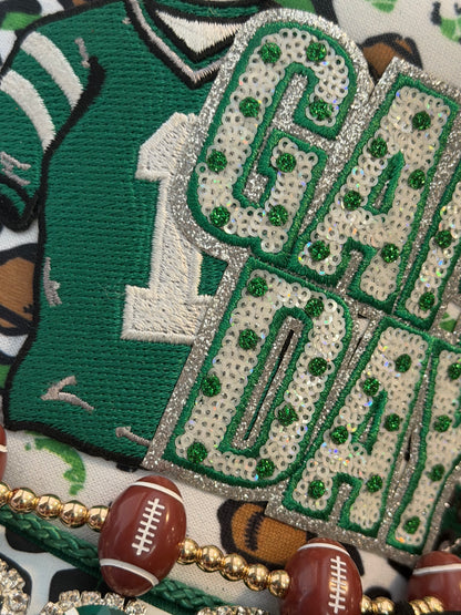 Blu Coconut green game day football Trucker hat